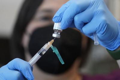 A registered nurse prepares a dose of a Monkeypox vaccine at the Salt Lake County Health Department on July 28, 2022, in Salt Lake City.