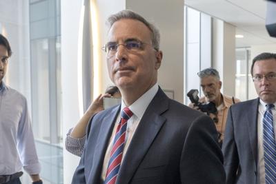 Former White House counsel Pat Cipollone arrives at an interview room in the Ford House Office Building after a break from interviewing with the Jan. 6 select committee, on Capitol Hill in Washington, Friday, July 8, 2022.