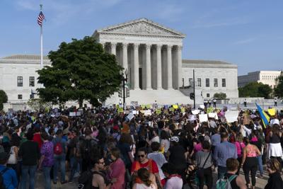 Abortion rights activist protest outside of the U.S. Supreme Court Tuesday, May 3, 2022 in Washington.