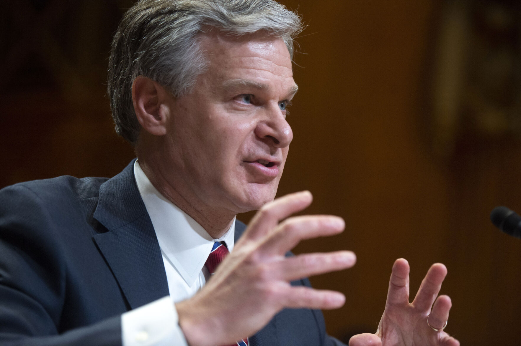 Director of the Federal Bureau of Investigation Christopher Wray testifies during a Senate Appropriations Subcommittee hearing on the fiscal year 2023 budget for the FBI in Washington, D.C.