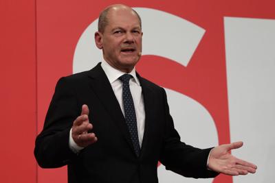Olaf Scholz, top candidate for chancellor of the Social Democratic Party (SPD) addresses his supporters after German parliament election at the party’s headquarters in Berlin, on Sept. 26, 2021.