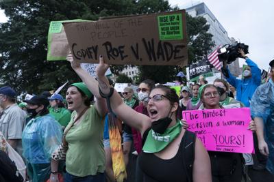 Abortion-rights activists march to the White House during a rally in Washington, Saturday, July 9, 2022.