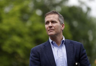 Then-Missouri Gov. Eric Greitens waits to deliver remarks to a small group of supporters near the capitol in Jefferson City, Mo. on May 17, 2018.
