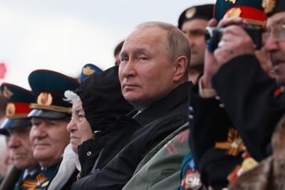Russian President Vladimir Putin looks on during the Victory Day military parade marking the 77th anniversary of the end of World War II in Moscow, Russia, on May 9, 2022.
