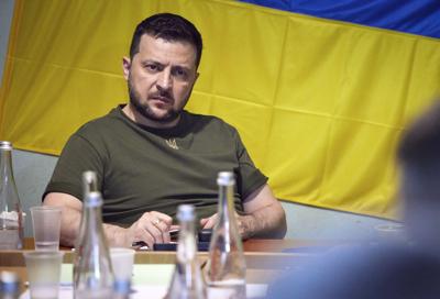 Ukrainian President Volodymyr Zelenskyy attends a meeting with military officials as he visits the war-hit Mykolaiv region.