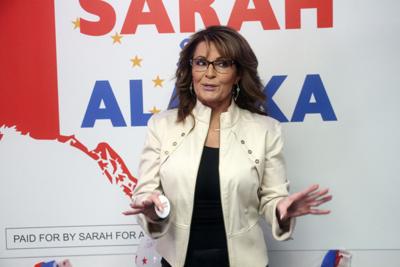 Former Alaska Gov. Sarah Palin addresses supporters at the opening of her new campaign.