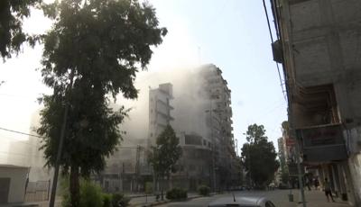 Smoke pours out of a building after Israeli airstrikes in Gaza City on Friday.   “Anyone who tries to harm Israel should know: We will find you,”  Prime Minister Yair Lapid said.