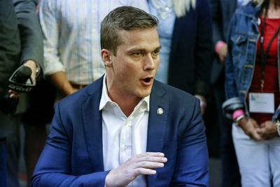 Rep. Madison Cawthorn speaks to supporters and the media at his primary election night watch party in Hendersonville, N.C., on May 17, 2022.