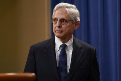 Attorney General Merrick Garland listens to a question as he leaves the podium after speaking at the Justice Department Thursday, Aug. 11, 2022, in Washington.