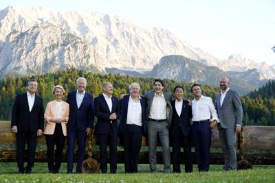 Members of the G7 from left, Prime Minister of Italy Mario Draghi, European Commission President Ursula von der Leyen, President Joe Biden, German Chancellor Olaf Scholz, British Prime Minister Boris Johnson, Canadian Prime Minister Justin Trudeau, Prim...