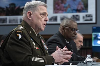Joint Chiefs Chair Gen. Mark Milley, accompanied by Secretary of Defense Lloyd Austin and Under Secretary of Defense Chief Financial Officer Michael McCord, testifies before the House Committee on Appropriations Subcommittee on Defense during a hearing ...