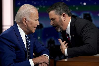 President Joe Biden speaks with host Jimmy Kimmel during a commercial break on Kimmel's show June 8, 2022, in Los Angeles.