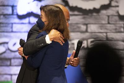 New York Gov. Kathy Hochul hugs Bishop Darius Pridgen during a service at True Bethel Baptist Church on May 15, 2022, in Buffalo, N.Y.