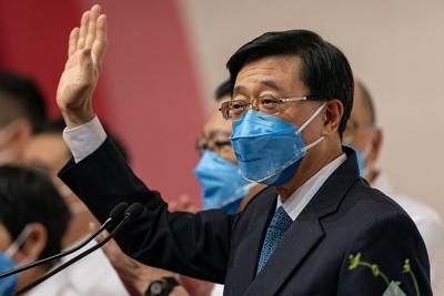 John Lee Ka-chiu, the territory’s former secretary of security, won an uncontested vote Sunday as the ruling Chinese Communist Party’s candidate of choice.