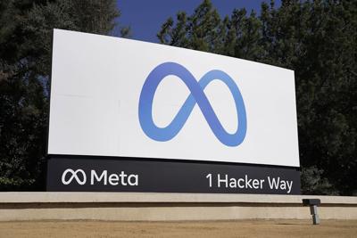 Facebook's Meta logo sign is seen at the company headquarters in Menlo Park, Calif. on Oct. 28, 2021.