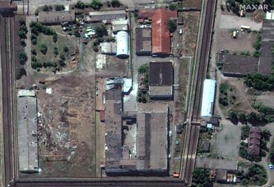 Satellite photos of the site released by Maxar Technologies on July 30 appear to show damage only to the section of the detention center housing Ukrainian prisoners, with no collateral damage to surrounding buildings.