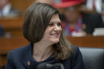 Rep. Haley Stevens sits with fellow Democrats on the House Education and Labor Committee during a bill markup, on Capitol Hill in Washington, Wednesday, March 6, 2019.