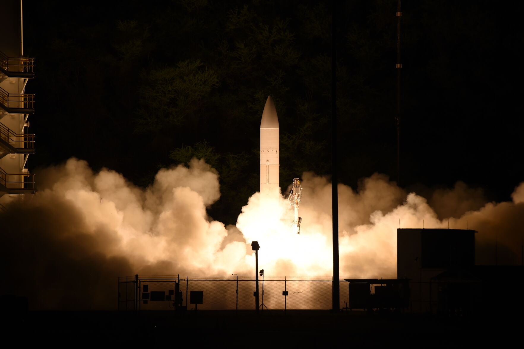This handout photo provided by the U.S. Navy shows a common hypersonic glide body launching from the Pacific Missile Range Facility, in Kauai, Hawaii, March 19, 2020, during a Department of Defense flight experiment.