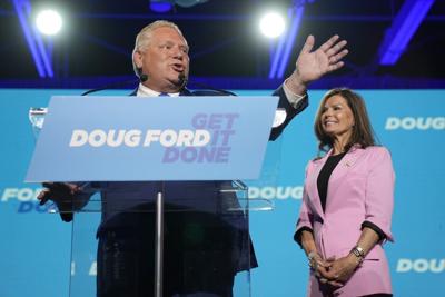 Ontario PC Party Leader Doug Ford and wife Karla react after he was projected to have been re-elected as the Premier of Ontario in Toronto Thursday, June 2, 2022. THE CANADIAN PRESS/Frank Gunn