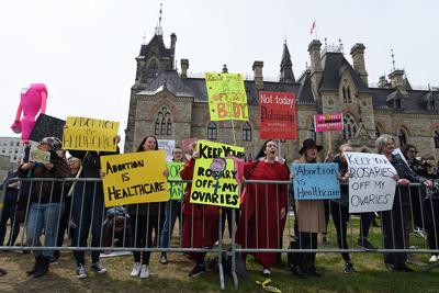People take part in the March For Life rally on Parliament Hill in Ottawa.