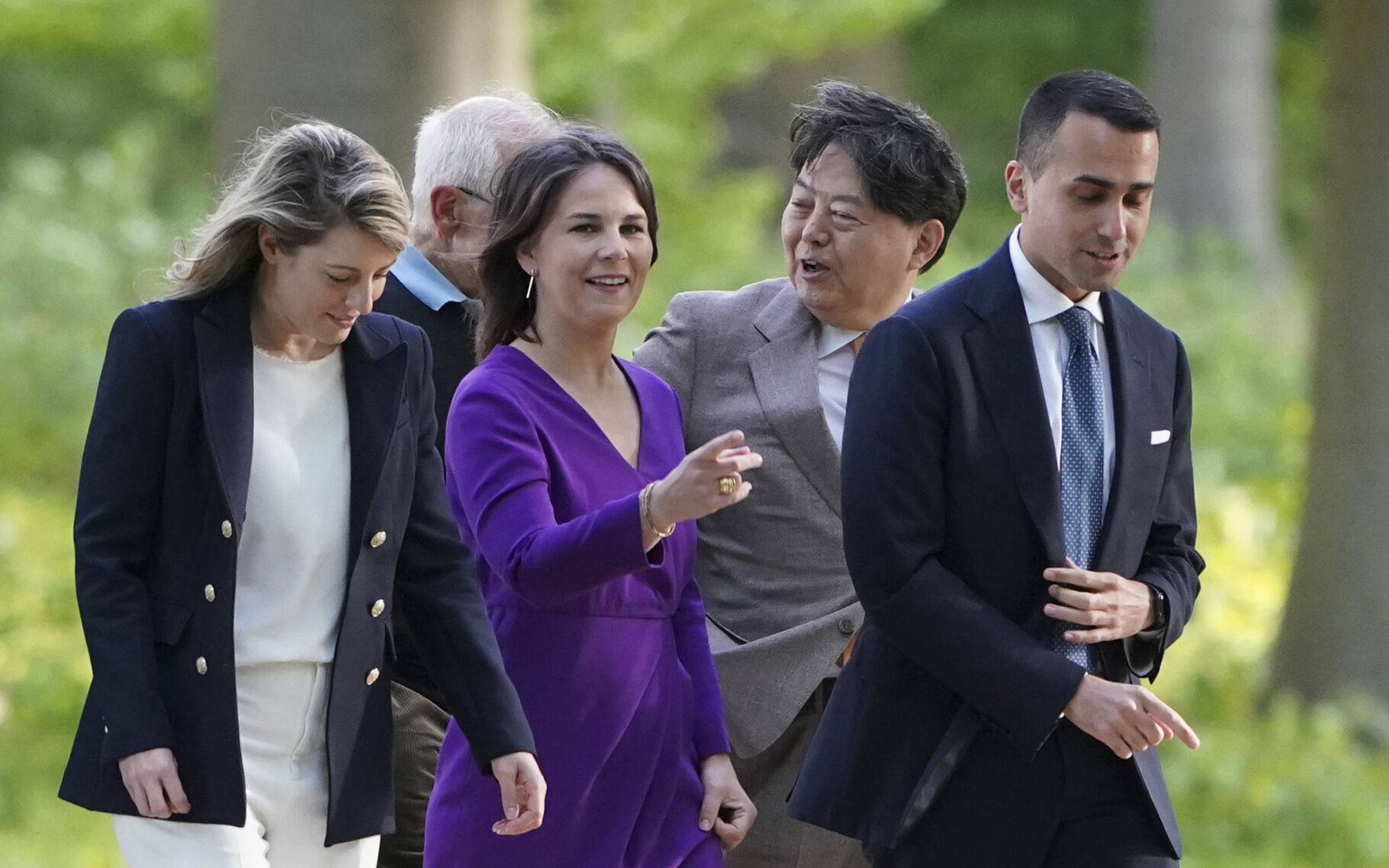 From left, Melanie Joly, Foreign Minister of Canada, Annalena Baerbock, Foreign Minister of Germany, Hayashi Yoshimasa, Foreign Minister of Japan, and Luigi Di Maio, Foreign Minister of Italy, walk to dinner at the summit of foreign ministers of the G7 ...