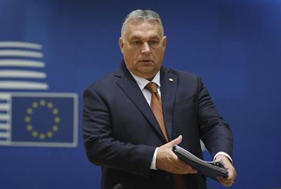 Hungary's Prime Minister Viktor Orbán arrives to a round table meeting at an EU summit in Brussels on Oct. 22, 2021.