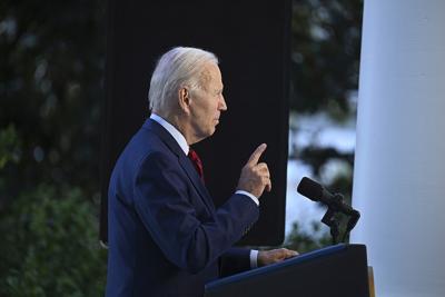 President Joe Biden speaks from the Blue Room Balcony of the White House on Aug. 1, 2022, in Washington, D.C.