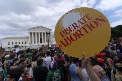 Abortion-rights activists gather outside the Supreme Court in Washington, Friday, June 24, 2022.