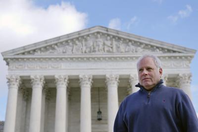 FILE - David Cassirer, the great-grandson of Lilly Cassirer, poses for a photo outside the Supreme Court in Washington, Jan. 18, 2022.