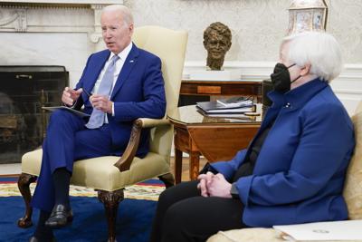 President Joe Biden meets with Treasury Secretary Janet Yellen, right, in the Oval Office of the White House, Tuesday, May 31, 2022.
