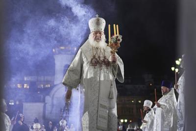 Russian Orthodox Church Patriarch Kirill conducts the Easter service at the Christ the Savior Cathedral in Moscow, Russia, late Saturday, April 23, 2022.