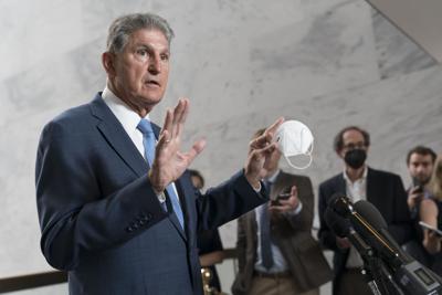 Sen. Joe Manchin speaks to reporters at the Capitol in Washington on Aug. 1, 2022.