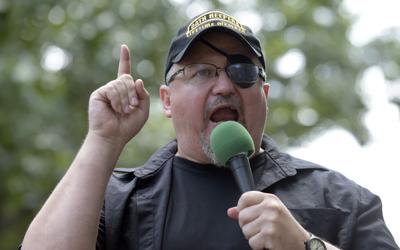 Stewart Rhodes, founder of the Oath Keepers, speaks during a rally outside the White House in Washington.