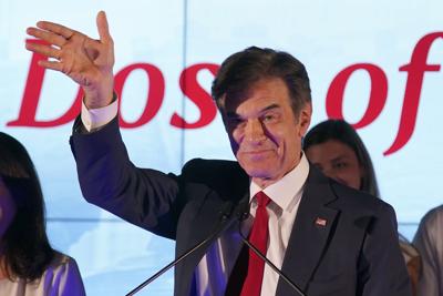 Mehmet Oz, a Republican candidate for U.S. Senate in Pennsylvania, waves to supporters at a primary night election gathering in Newtown, Pennsylvania on Tuesday.