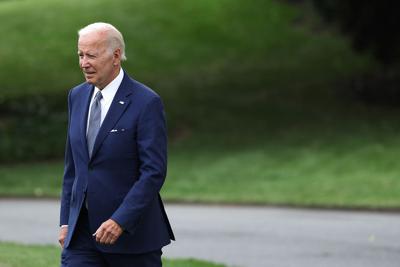 President Joe Biden walks on the South Lawn prior to his departure from the White House on July 8, 2022.