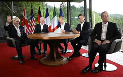 From left, Britain's Prime Minister Boris Johnson, U.S. President Joe Biden, Germany's Chancellor Olaf Scholz, France's President Emmanuel Macron and Italy's Prime Minister Mario Draghi pose for a photo during the G-7 leaders summit at Castle Elmau in K...