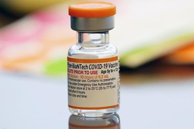 A vial of the Pfizer-BioNTech Covid-19 vaccine for children ages 5-12 sits ready for use at a vaccination site in Fort Worth, Texas.