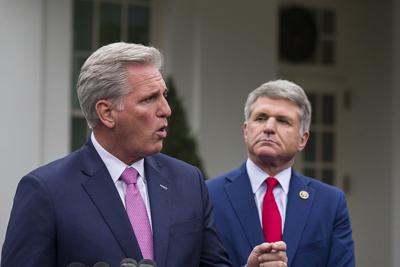 House Minority Leader Kevin McCarthy, left, and Rep. Michael McCaul, right, speak with reporters.