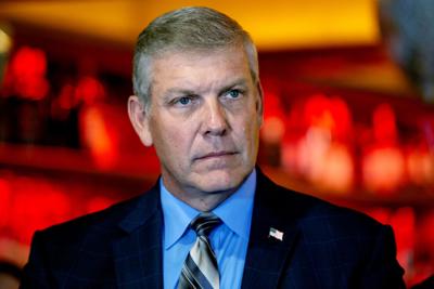 Rep. Barry Loudermilk (R-Ga.) listens to a speaker at a press conference.