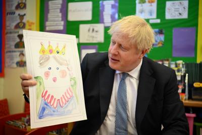 British Prime Minister Boris Johnson visits  the Field End Infant school in London on May 6, 2022.