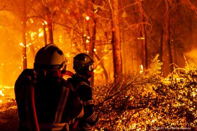 A wildfire near Saint-Magne, south of Bordeaux, southwestern France, on Aug. 12, 2022.