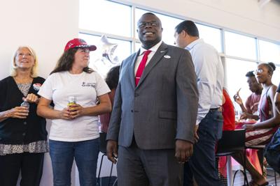 John Gibbs watches as Michigan primary election results come in during a watch party at Re/Max of Grand Rapids in Kent County on Tuesday, Aug. 2, 2022 in Byron Center, Mich.