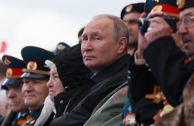 Vladimir Putin looks on during the Victory Day military parade in Moscow, May 9.