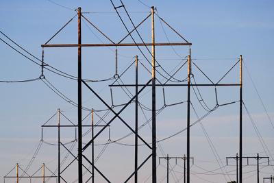 Central Maine Power utility lines are seen in Pownal, Maine.