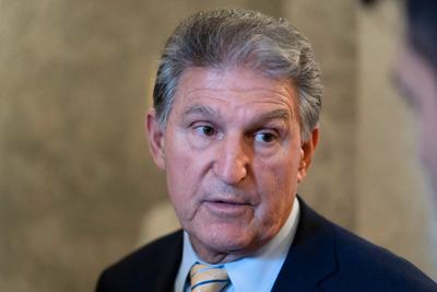Sen. Joe Manchin, D-W.Va., talks with reporters as the Senate voted on a key test vote on the For the People Act.