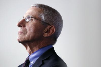Dr. Anthony Fauci, director of the National Institute of Allergy and Infectious Diseases, listens during a briefing about the coronavirus at the White House in Washington, April 9, 2020.