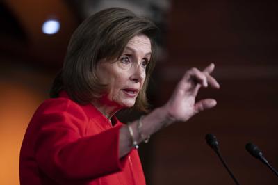 Speaker of the House Nancy Pelosi, D-Calif., meets with reporters during a news conference at the Capitol in Washington, Wednesday, Dec. 8, 2021. Congressional leaders reached a deal to lift the nation's debt limit that will allow Democrats to increase ...