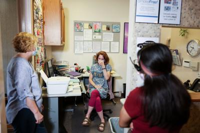 Tammi Kromenaker and Sarah Haeder meet each other in the lobby after hearing the news that Roe v. Wade had been overturned at Red River Women’s Clinic in Fargo, N.D., on Friday, June 24, 2022. The clinic is the only abortion provider in the state of Nor...