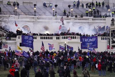 Violent insurrectionists loyal to then-President Donald Trump, storm the Capitol, Jan. 6, 2021, in Washington.