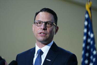 Pennsylvania Attorney General Josh Shapiro speaks with members of the media during a news conference in Philadelphia on March 15, 2022.